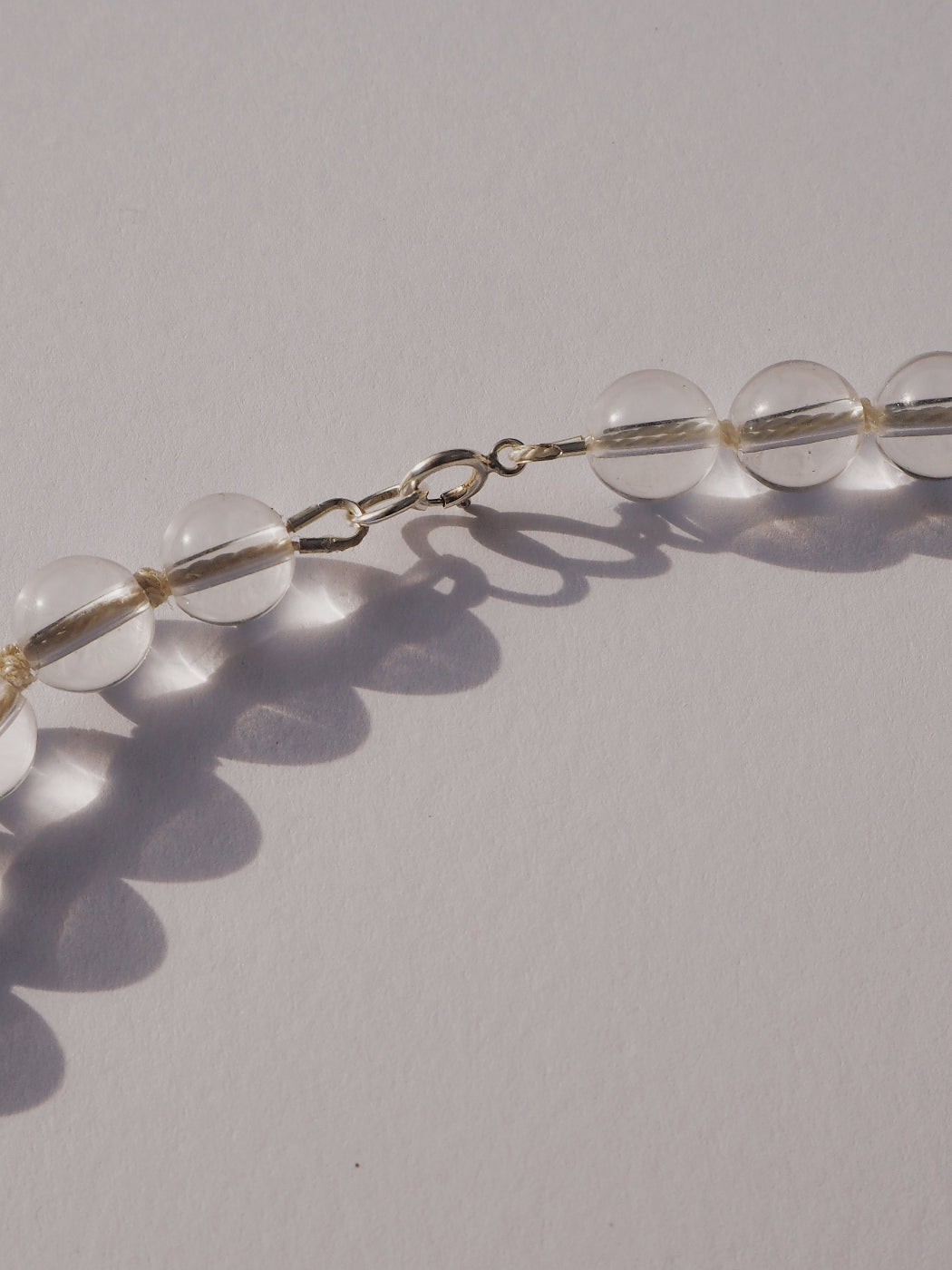 COUPER -ET- COUDRE Necklace Penumbra - Clear Quartz + White Silk Necklace