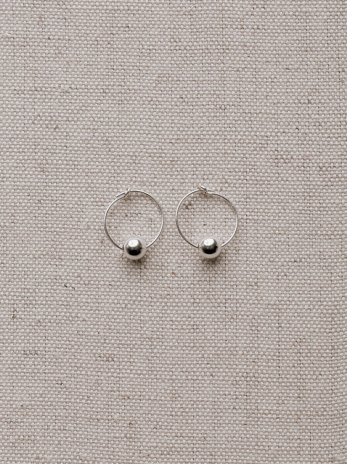 Emily Georgina Jones Jewellery Mini Bauble Hoops in Sterling Silver